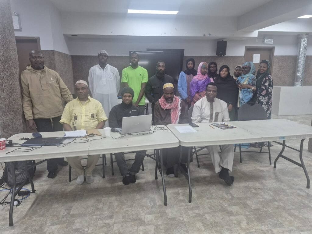 Members of Hadinkai Humanitarian Society's Executive Committee and wider community attending the First Annual General Meeting in Edmonton.